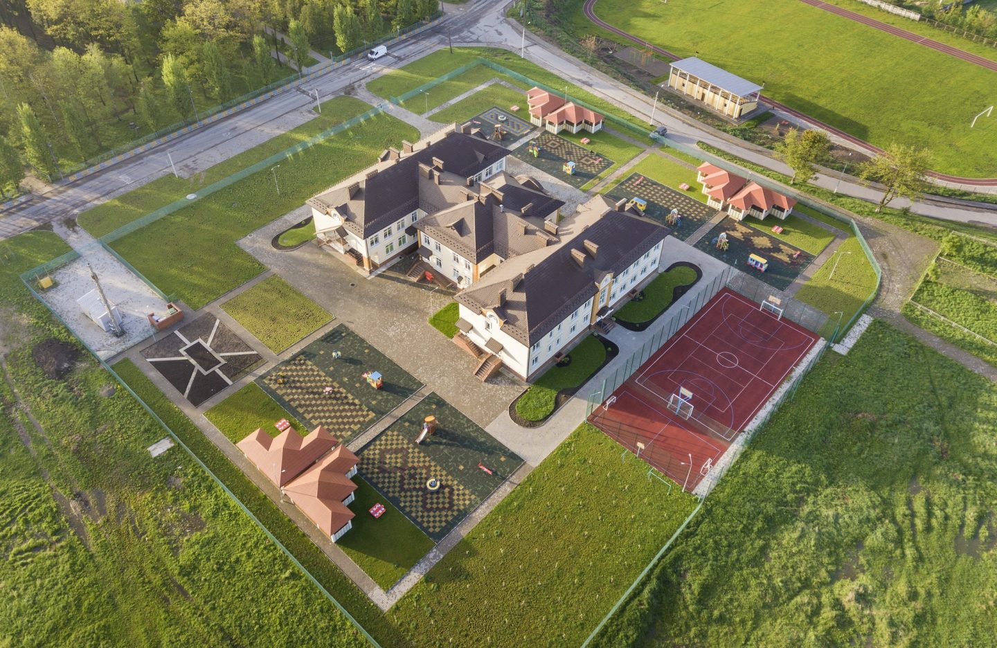 Aerial view of new prescool building in residential rural area.
